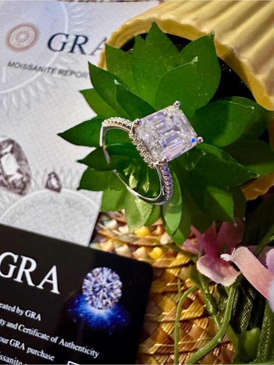 Moissanite Jewelry - Moissanite Emerald-Cut Solitaire Sterling Silver Ring with Pavé Band